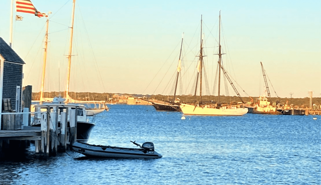 Tall Ships Along Working Boats in Vineyard Haven Harbor 1110x640